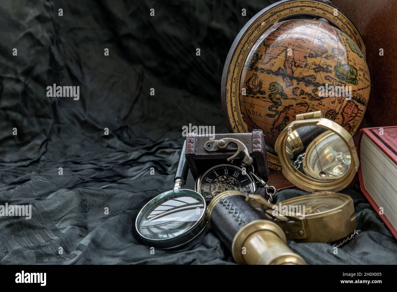 Travel or adventure concept background. Pocket watch binoculars antique compass globe and magnifying glass on dark background. Journey Concept Cop Stock Photo Alamy