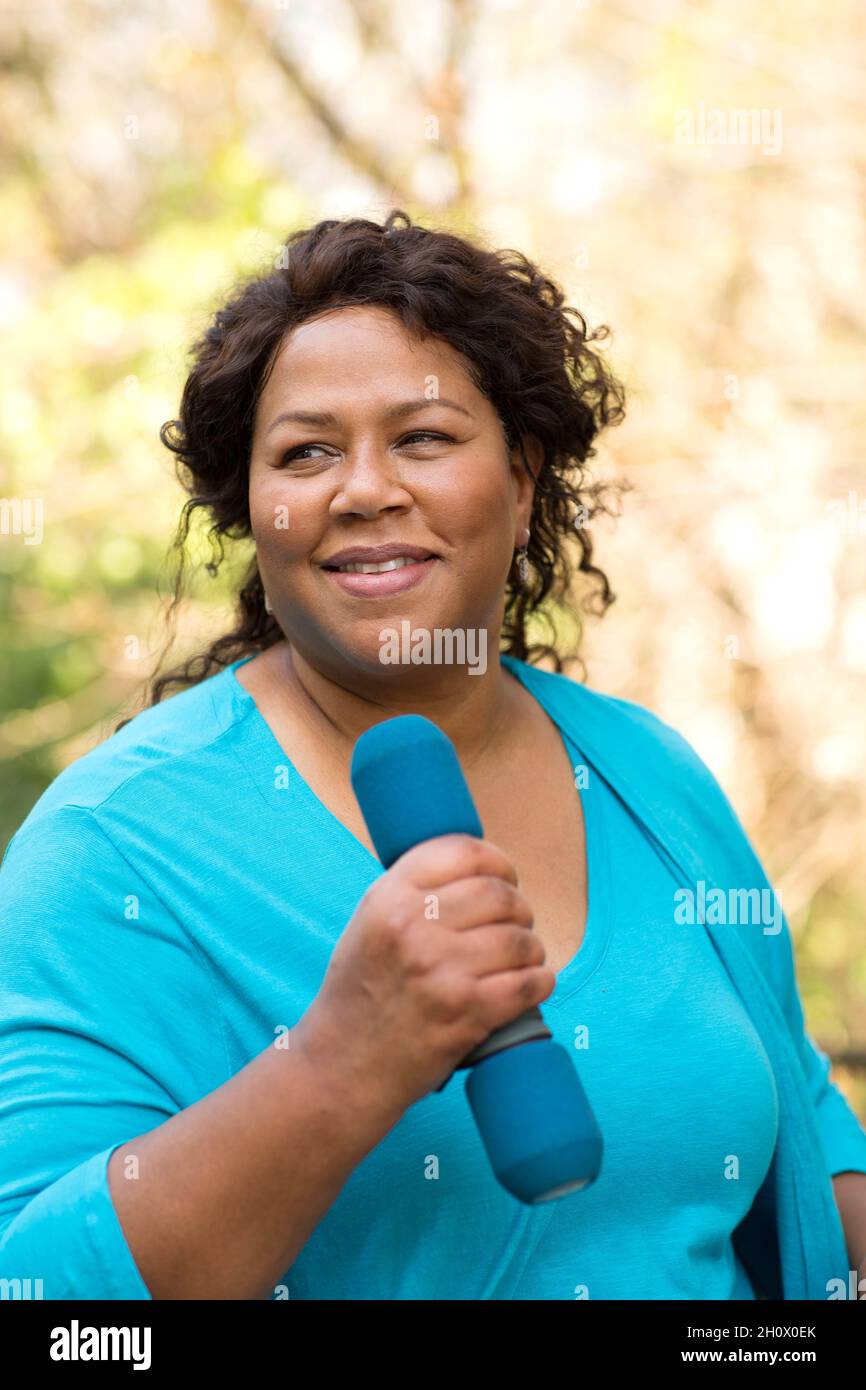 Beautiful mature African American woman smiling and laughing. Stock Photo