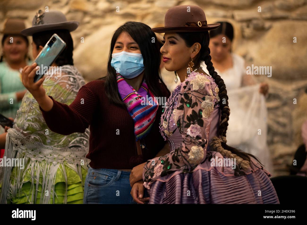 La Paz, Bolivia. 14th Oct, 2021. A model poses for a selfie backstage