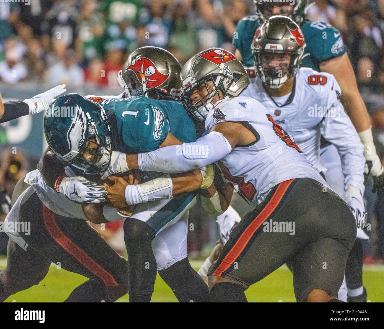 Philadelphia, Pennsylvania, USA. 14th Oct, 2021. Eagles quarterback JALEN HURTS, #1, breaks free of Tampa Bay linebacker KEVIN MINTER, #51, to score a touchdown during an NFL football game between the Philadelphia Eagles and the Tampa Bay Buccaneers at Lincoln Financial Field in Philadelphia, Pennsylvania. Tampa Bay won 28-22. (Credit Image: © Jim Z. Rider/ZUMA Press Wire) Stock Photo