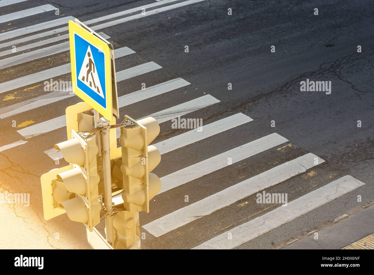 Traffic lights over urban intersection. a traffic light with a ...