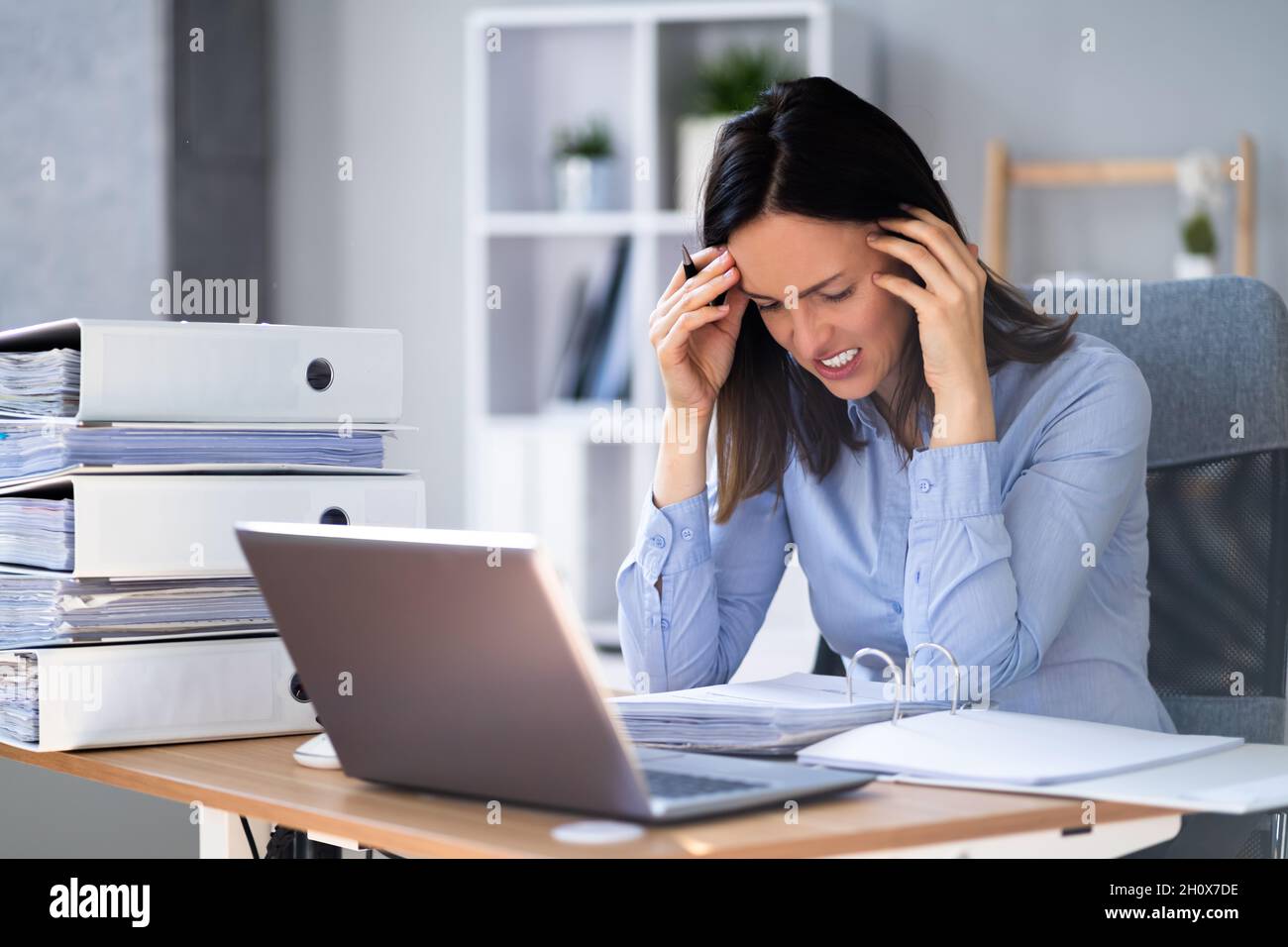 Bored Workaholic Accountant Employee With Headache And Stress Stock Photo Alamy