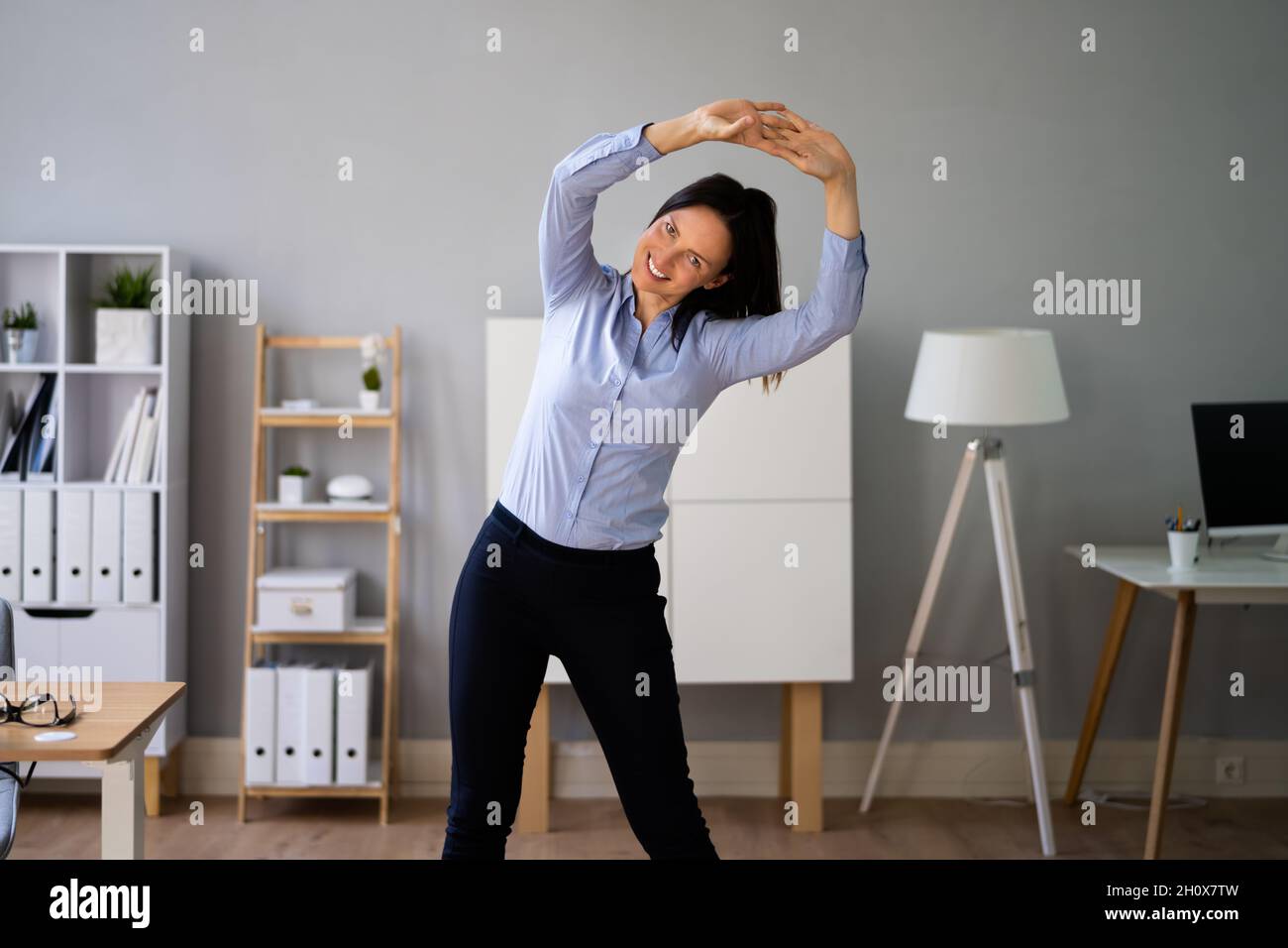 Stretching Office Workout. Desk Stretch Exercise At Workplace Stock