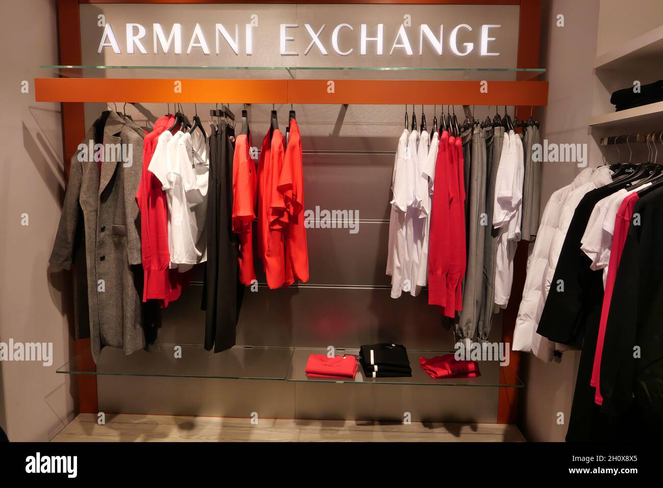 ARMANI EXCHANGE CLOTHING ON DISPLAY INSIDE THE FASHION STORE Stock Photo -  Alamy