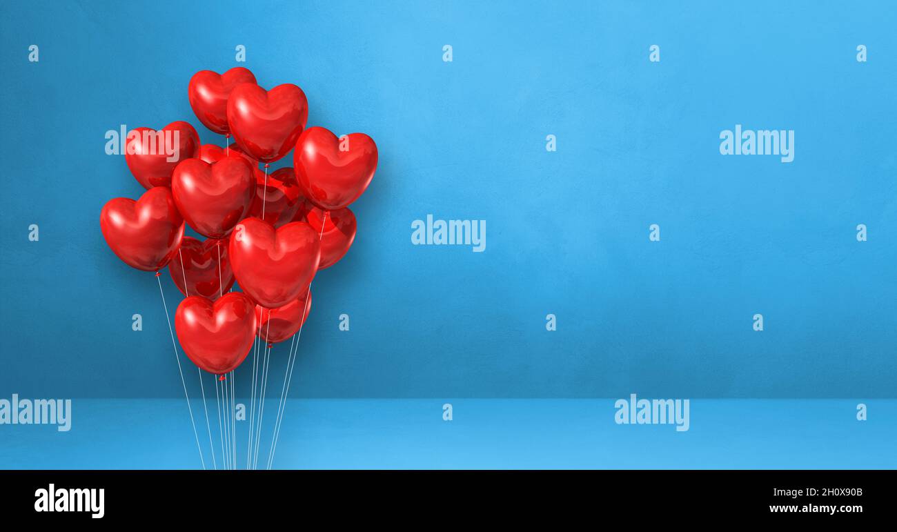 Red heart shape balloons bunch on a blue wall background. Horizontal ...