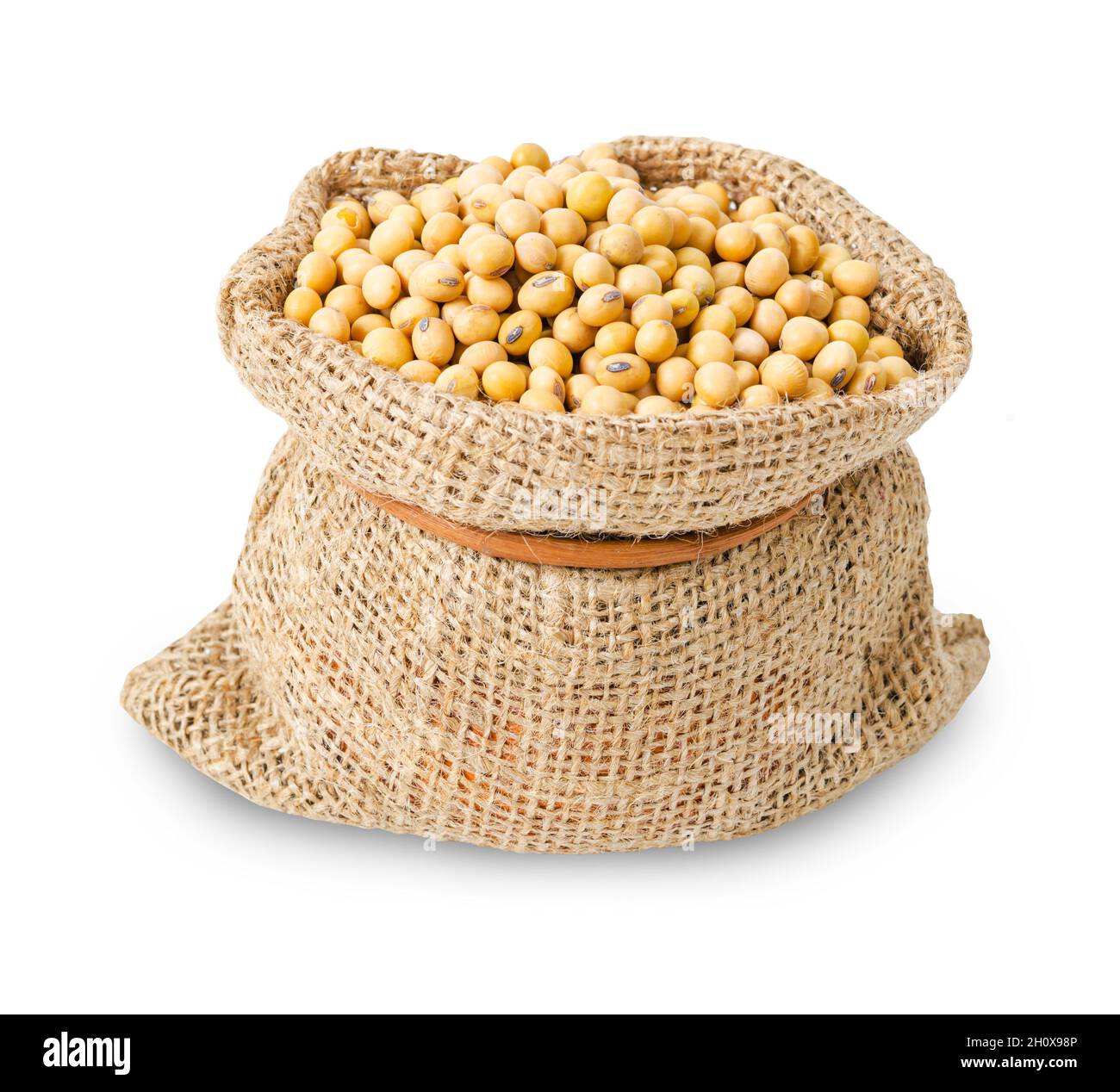 Dried soya beans in bag sack isolated on white background, Save clipping path. Stock Photo