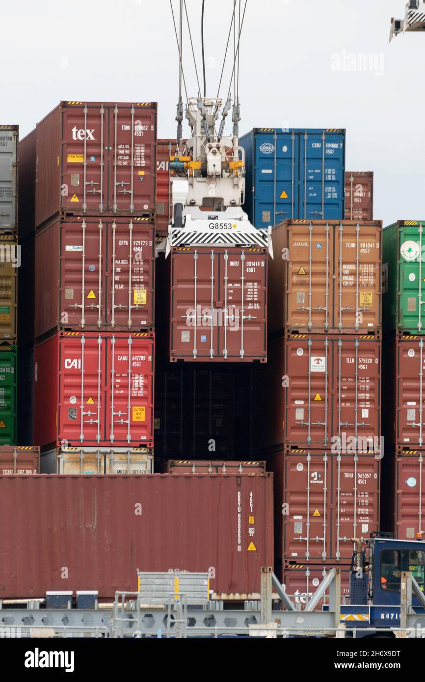 14/10/2021. Felixstowe, UK. The Port of Felixstowe has had to turn away ships from Asia because of a backlog of containers not being distributed due to the  shortage of HGV drivers. AP Moller-Maresk, the worlds largest container company has had to load containers onto smaller ships bound for the UK. This is having a disruptive effect as the shipping industry enters the pre-Christmas period of delivery with a possible shortage of Christmas goods being sold in the UK. Stock Photo