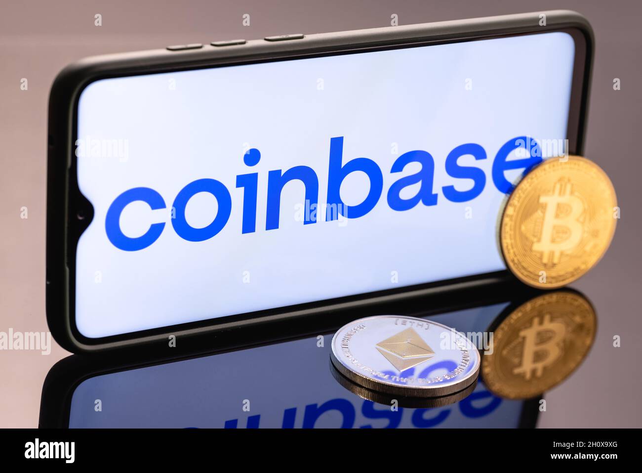Coinbase, is an American company that operates a cryptocurrency exchange  platform. Ethereum coin and Bitcoin on the background of the coinbase logo  Stock Photo - Alamy