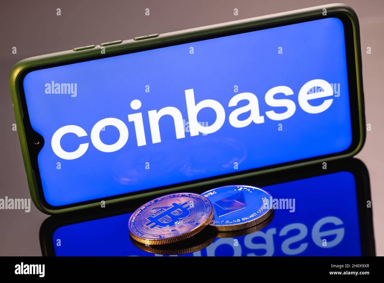 Coinbase, is an American company that operates a cryptocurrency exchange  platform. Ethereum coin and Bitcoin on the background of the coinbase logo  Stock Photo - Alamy