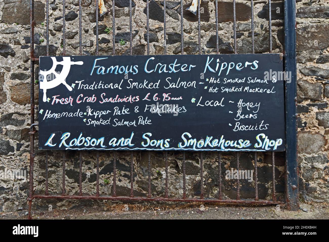Sign outside L Robson & Sons smokehouse, Craster Stock Photo