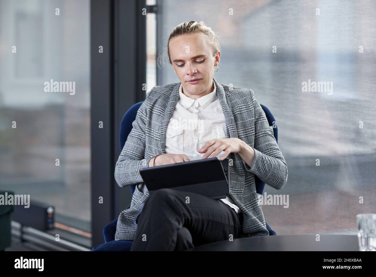 Man using digital tablet Stock Photo