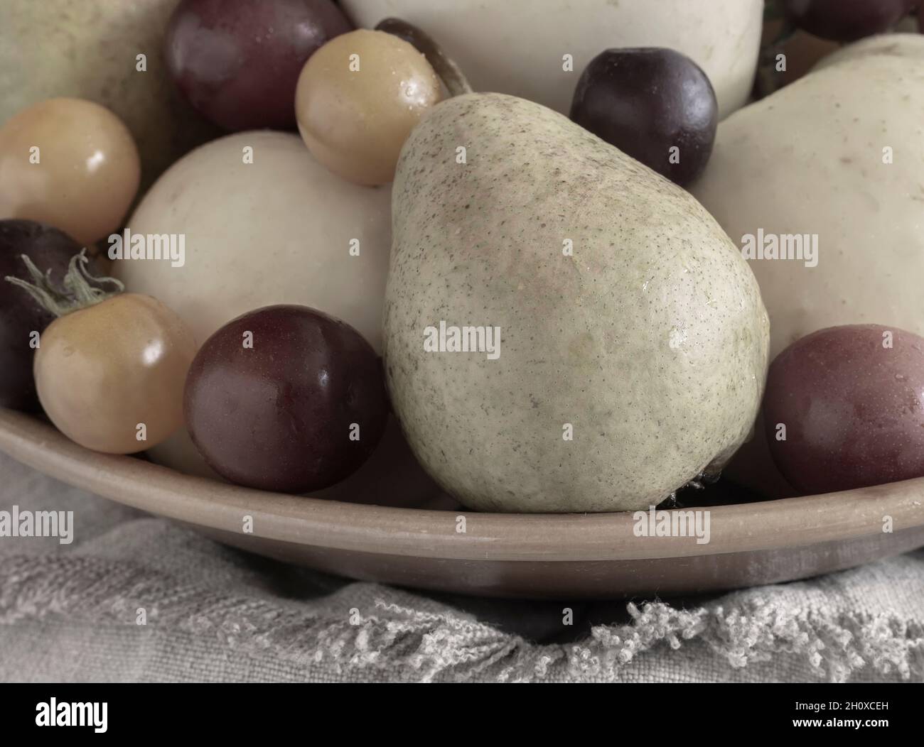 Still life: fruit in a ceramic plate Stock Photo