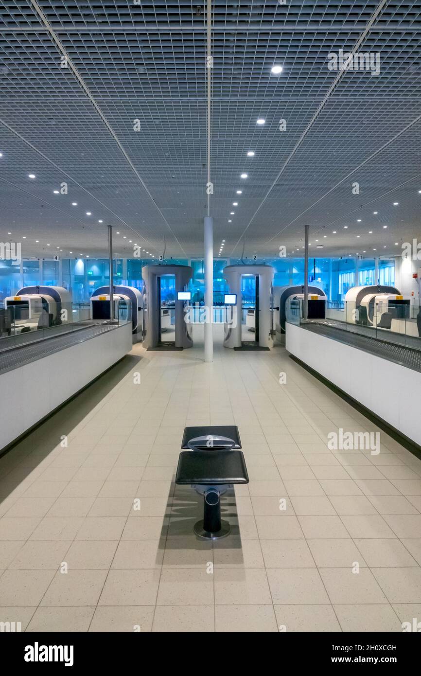 Airport security checkpoint with x-ray scanners for people and baggage. No people Stock Photo