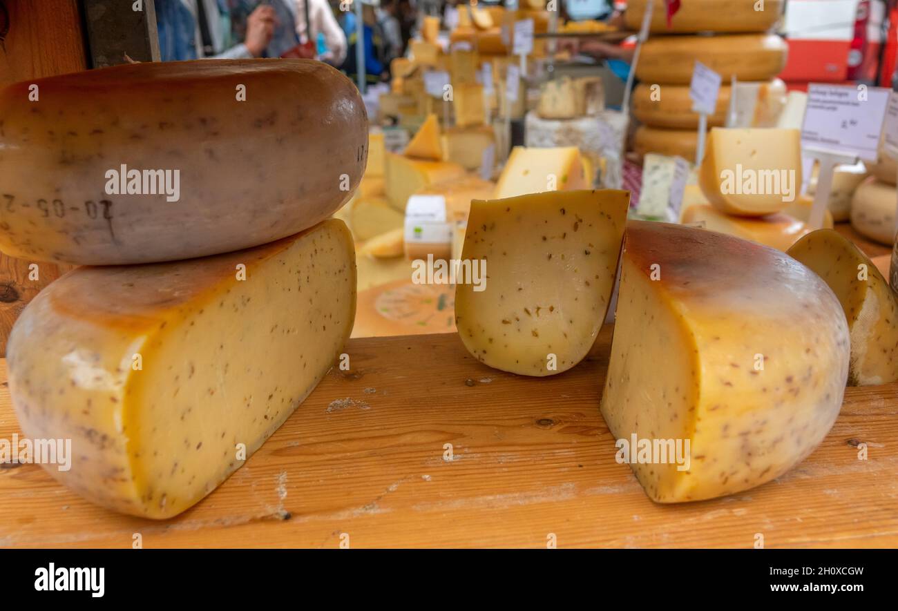 Netherlands. Farm market in Amsterdam. Many types of cheeses Stock Photo