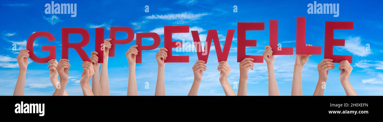 People Hands Holding Word Grippewelle Means Flu Epidemic, Blue Sky Stock Photo