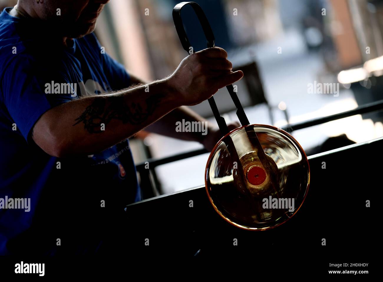 Master glass blower during hot glass working in Venice, Italy, May 15