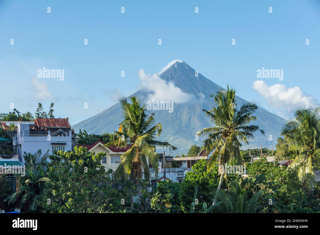 Mount Mayon, the most active stratovolcano of the Philippines. Seen from the city of Legazpi, Albay Province,  Bicol Region, Luzon island Stock Photo