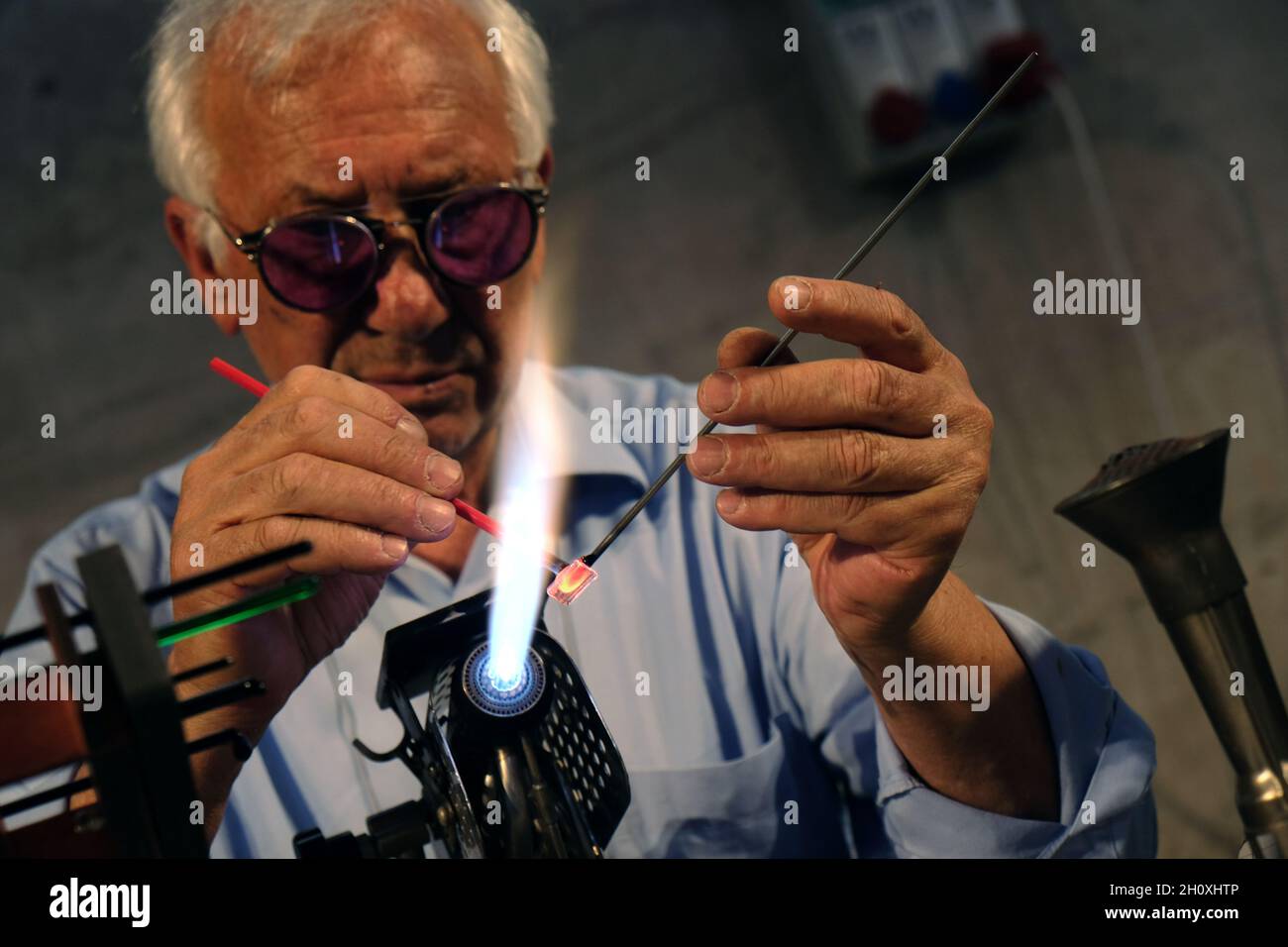 Master glass blower during hot glass working in Venice, Italy, May 15