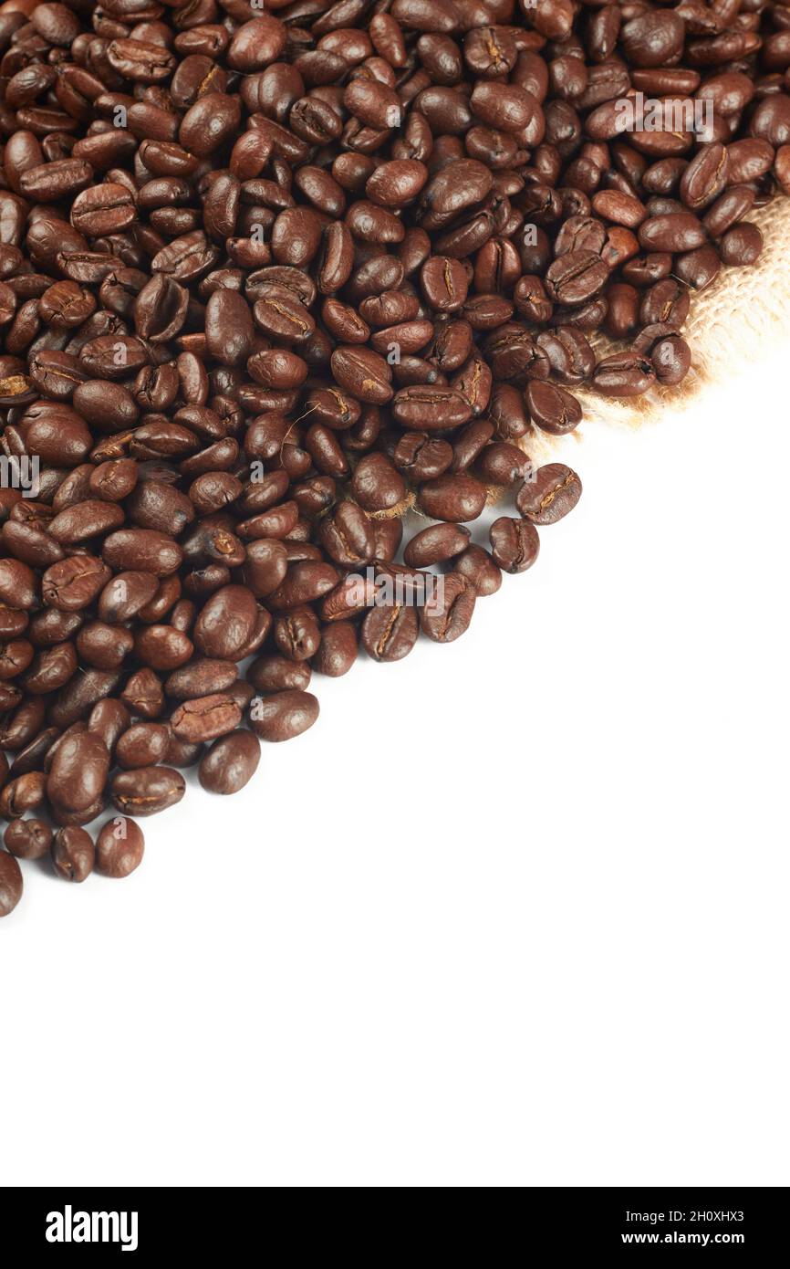 Roasted coffee beans with copy space on white background Stock Photo ...