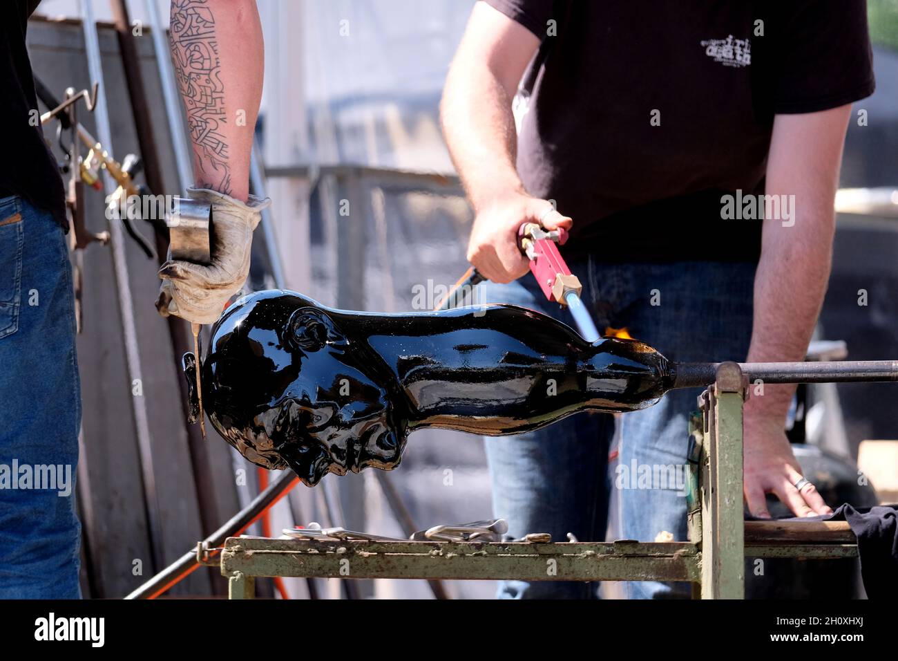 Master glass blower during hot glass working in Venice, Italy, May 15