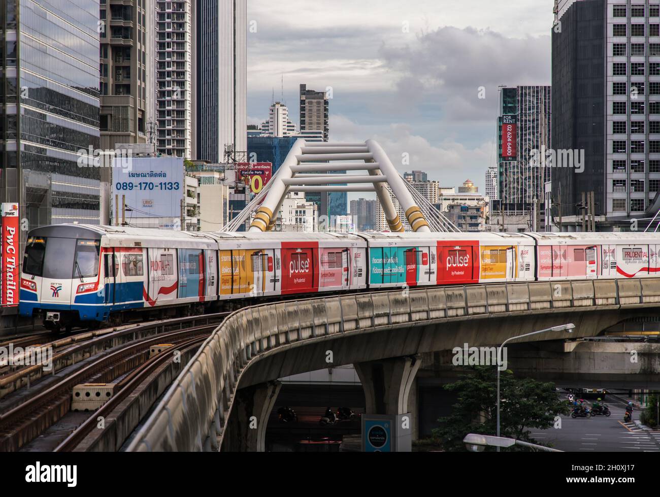 Bangkok, Thailand - Oct 03, 2020 :  BTS Sky Train is running in downtown pass through skycrapers business building in central business district of Ban Stock Photo