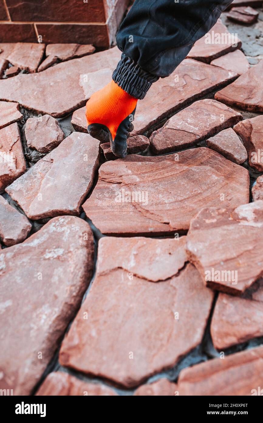 Bonding granite tiles to concrete subfloors outside the house porch