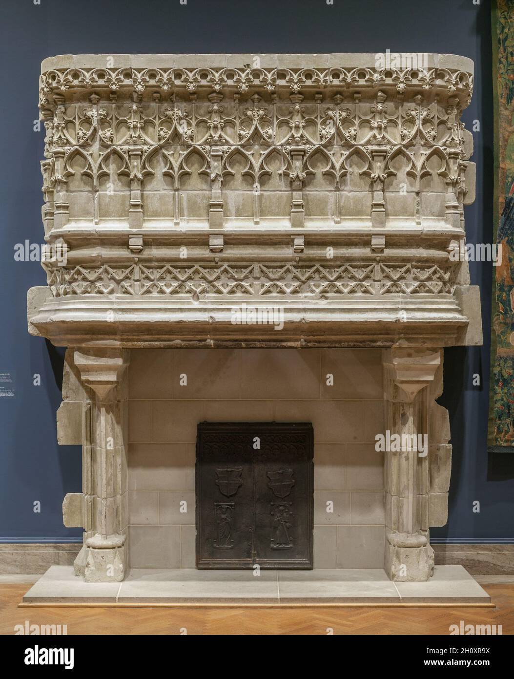 Chimney Piece, c. 1480-1520. France, Champagne, late 15th century-early 16th century. Limestone; overall: 425.9 x 321.2 x 82.6 cm (167 11/16 x 126 7/16 x 32 1/2 in.).  This chimney piece is believed to have once been part of the château at Amand-les-Eaux in northern France. Stock Photo