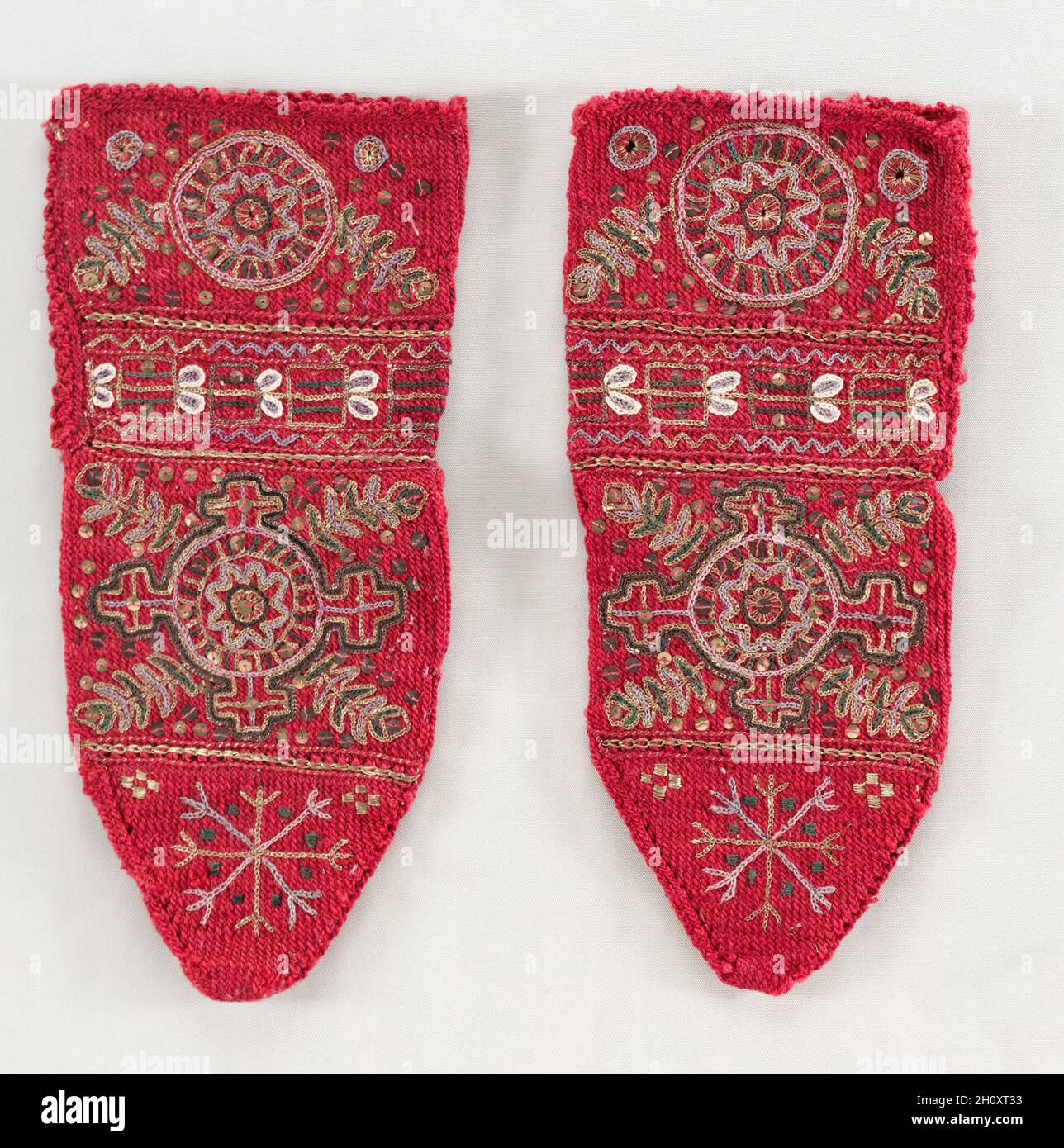 Woman's Bridal Socks, early 1900s. Yugoslavia, Serbia, 20th century. Embroidered wool, gold thread, sequins, knitting; overall: 33 x 15.9 cm (13 x 6 1/4 in.). Stock Photo