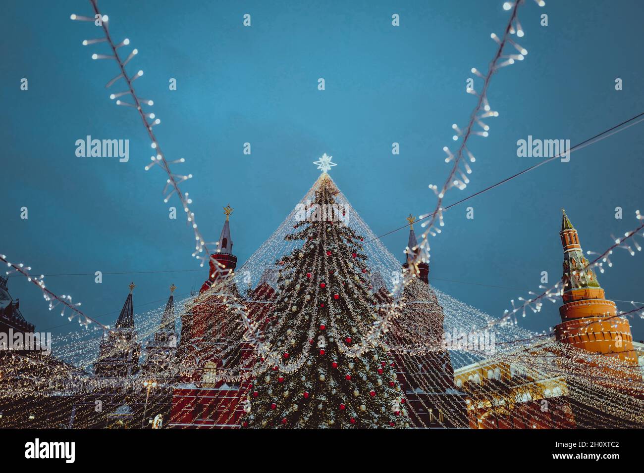 Christmas tree in Red Square Moscow decorated with gold balls, star