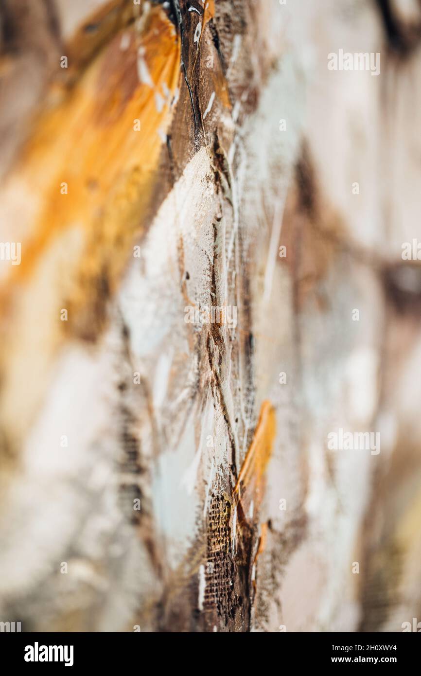 Close up relief of a thick layer of oil paint on canvas painting