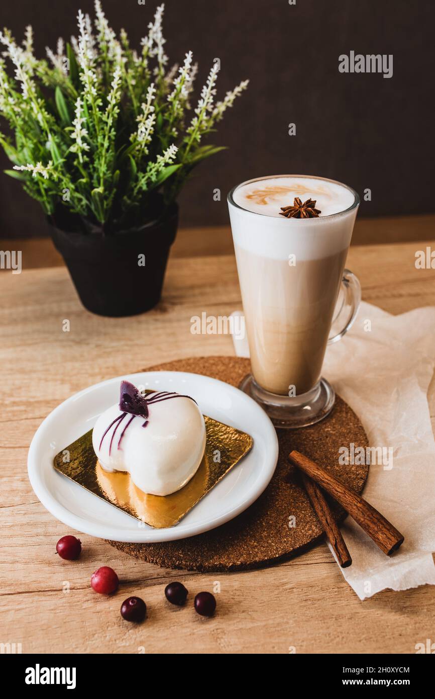 Sweet beautiful craft berry dessert in a cozy cafe with a cup of coffee Stock Photo