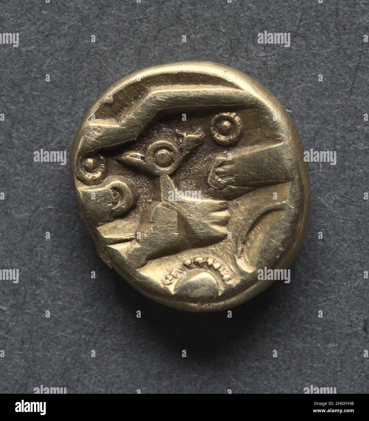 Quarter Stater: Tree-like Trophy on Triad of Ringed Pellets (obverse), c. 125-20 BC. England (Ancient Britain), 2nd century B.C.. Gold; diameter: 1 cm (3/8 in.). Stock Photo