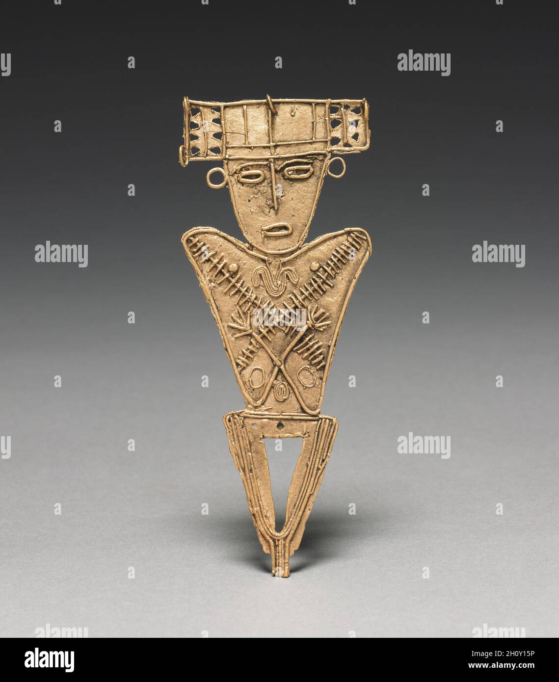 Tunjos (Votive Offering Figurine), c. 900-1550. Colombia, Muisca style, 10th-16th century. Cast gold; overall: 12.9 x 5.1 x 0.6 cm (5 1/16 x 2 x 1/4 in.).  Unlike the other gold ornaments made in the isthmian region, tunjos were not worn; instead, they served as offerings that were deposited in sacred places such as lagoons and caves. They often depict humans who hold something. Perhaps because they were not meant for display, tunjos were not finished after lost-wax casting. Flaws remain uncorrected, surfaces are unpolished, and gold that backed into the channel used to pour the molten metal i Stock Photo