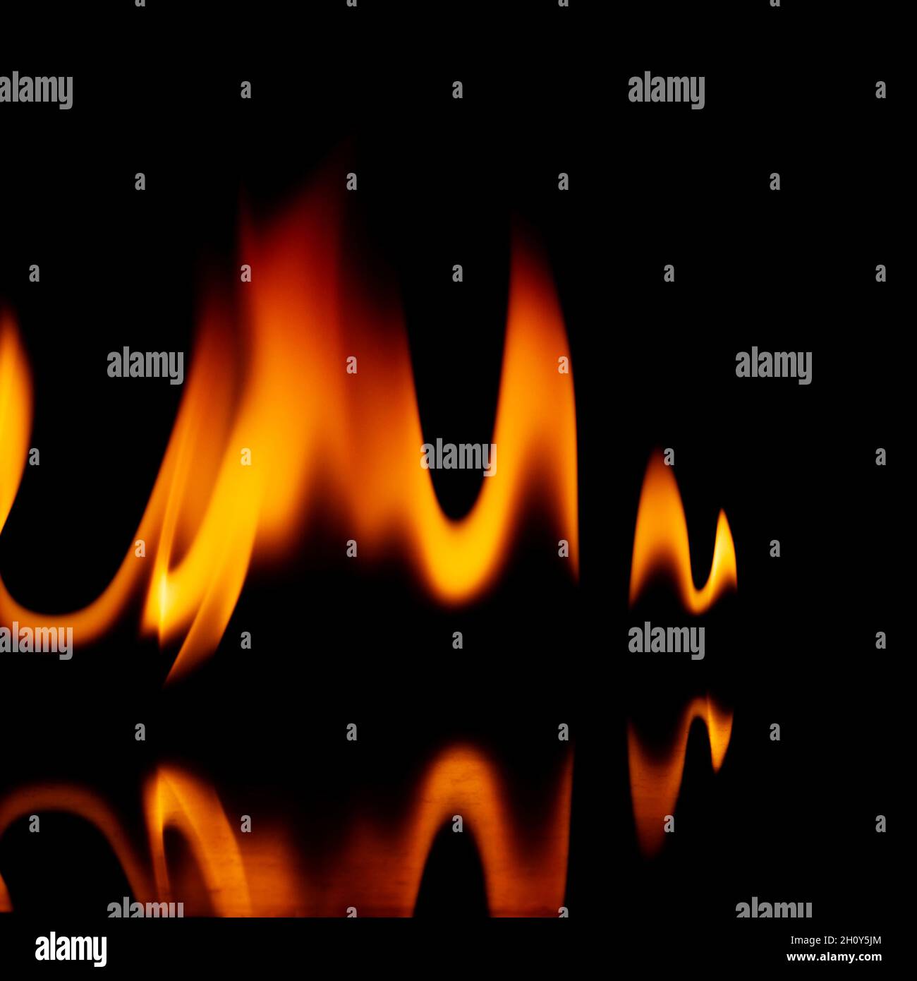 Fire flames isolated on a black background Stock Photo - Alamy