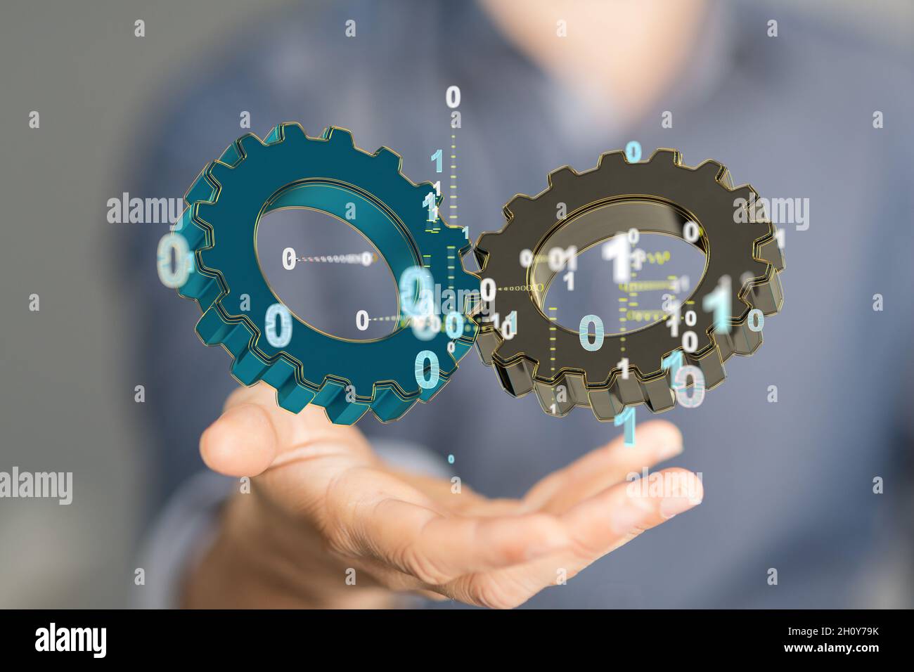 3D rendering of digital gears floating over a habusiness gear to