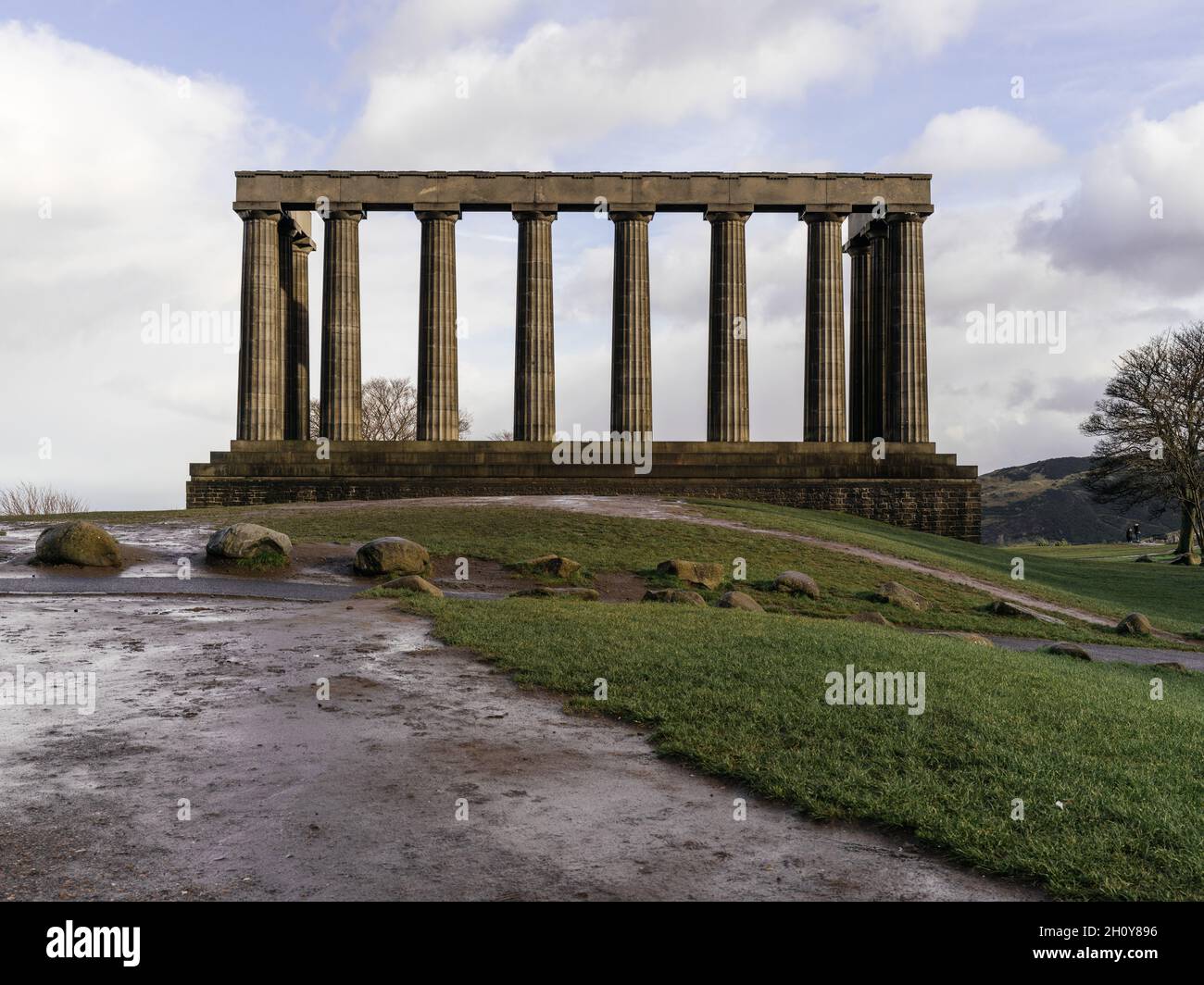 The National Monument Of Scotland On Calton Hill In Edinburgh on a sunny day after some rain. Stock Photo