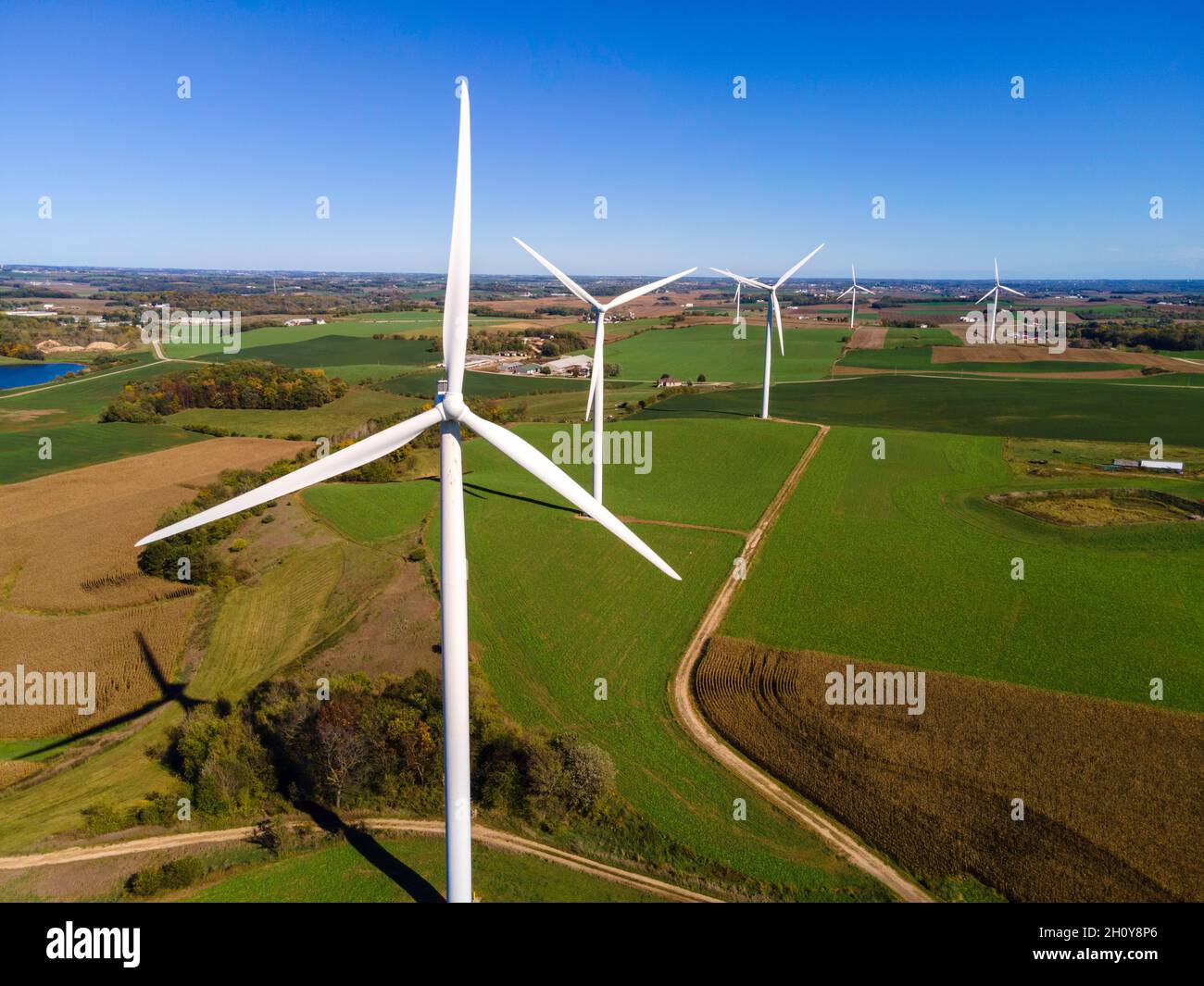 Windy Springfeild A wind turbine (windmill) generates electricity on a windy day in ...