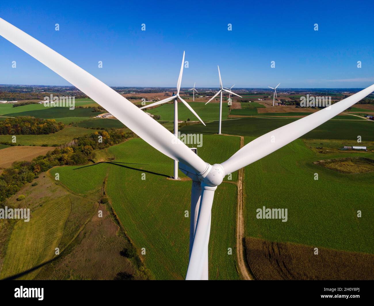 Windy Springfeild A wind turbine (windmill) generates electricity on a windy day in ...