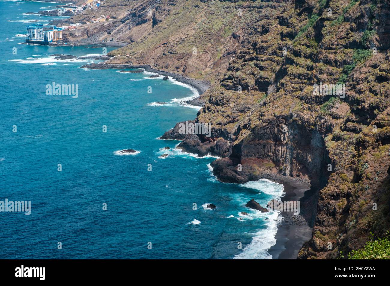 rocky cliff, beach and shore - aerial view of coastal landscape , Tenerife north Stock Photo