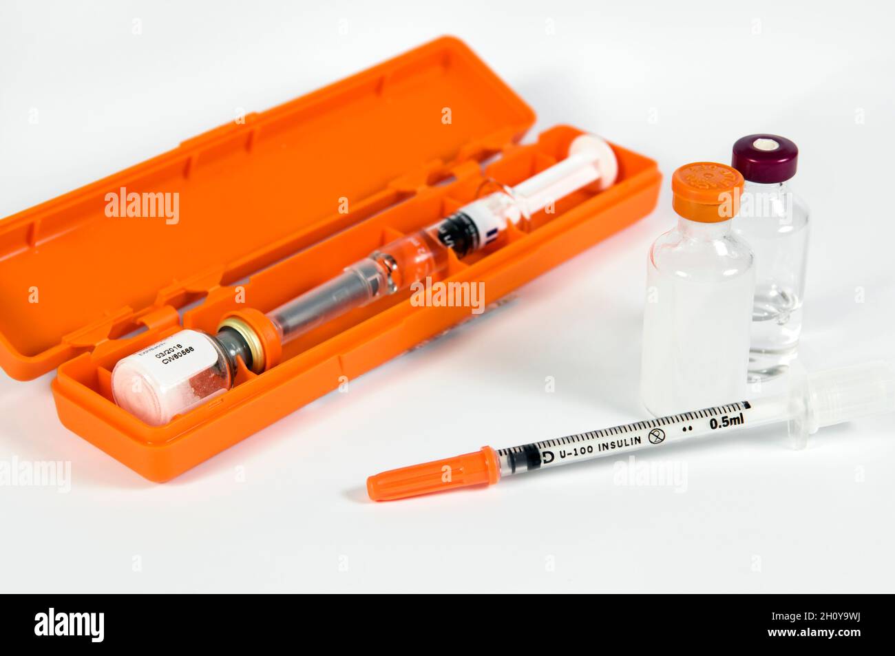 Diabetic insulin injection kit. Glucagon hydrochloride injection kit, with short and long acting vials of insulin and injection needle with safety cap Stock Photo