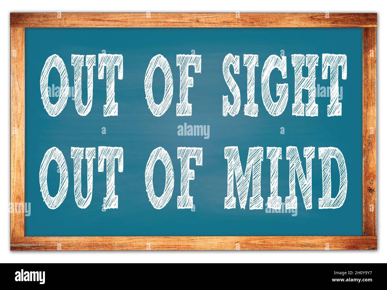 OUT OF SIGHT OUT OF MIND written on blue wooden frame school blackboard  Stock Photo - Alamy, image size:1300x975