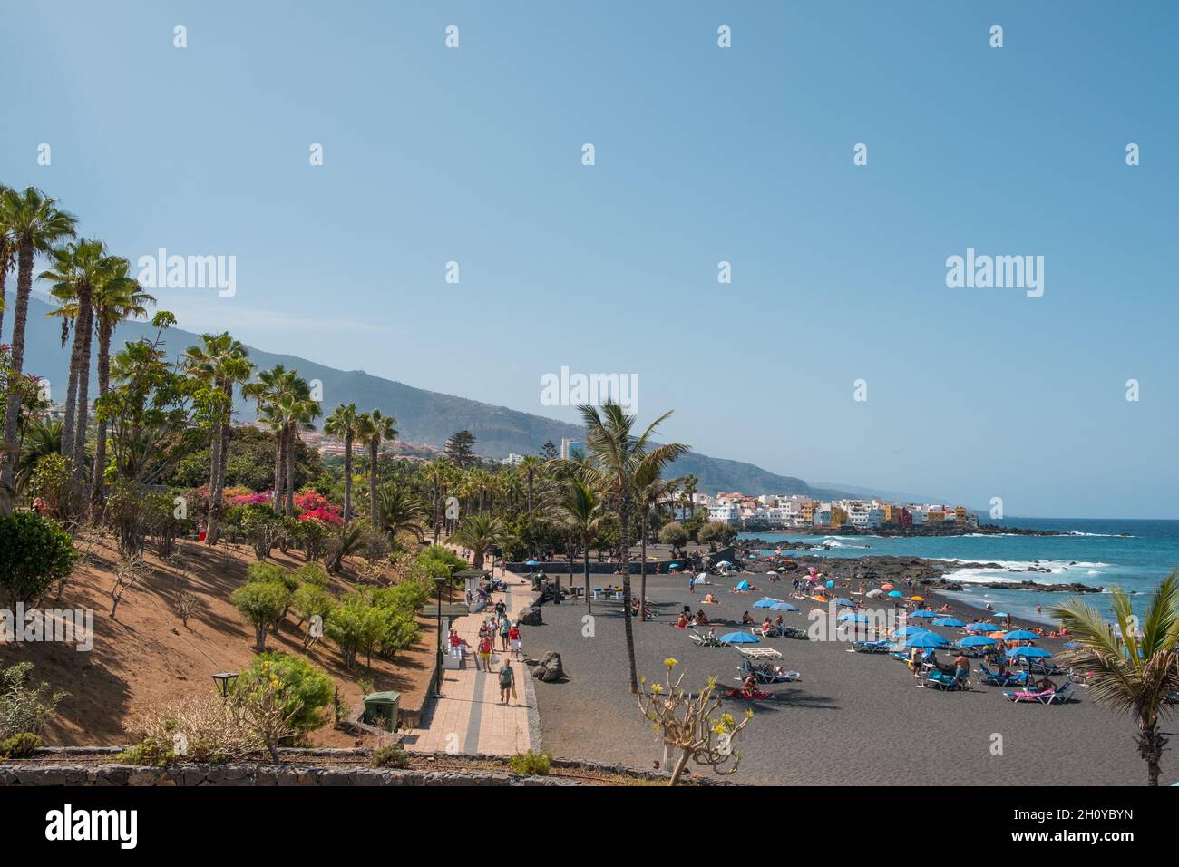 Tenerife, Spain - September, 2021: People at beach (Playa Jardin) in Puerto de la Cruz, Tenerife, Canary Islands Stock Photo