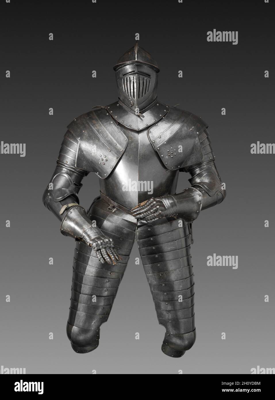 Cuirassier's Armor, c. 1600–20. Austria, Graz(?), early 17th century. Steel (originally blued, now black); leather straps; overall: 171.4 cm (67 1/2 in.).  The cuirassier was the heavy cavalryman of the late 1500s and early 1600s. Carrying pistols and a sword, he was clad in full armor, like this suit, with the exception of his lower legs, which were protected by heavy riding boots. Shortly after 1650, such heavy cavalry armor disappeared from use. By then, European cavalries had abandoned full armor as impractical against the increased sophistication of firearms. Similar armors survive in the Stock Photo
