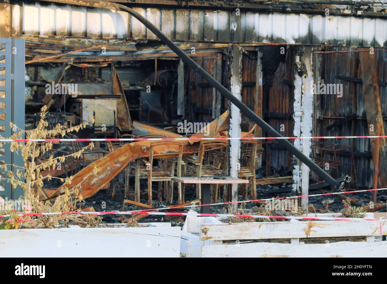 Burnt house with charred roof and burnt furniture Stock Photo - Alamy