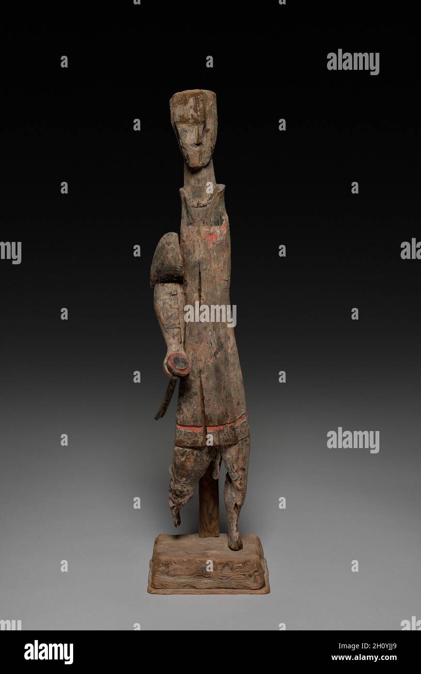 Figure with Sword, 4th-3rd Century BC. China, Eastern Zhou dynasty (771-256 BC), Warring States period (475-221 BC). Wood with traces of polychromy; overall: 49.5 cm (19 1/2 in.). Stock Photo