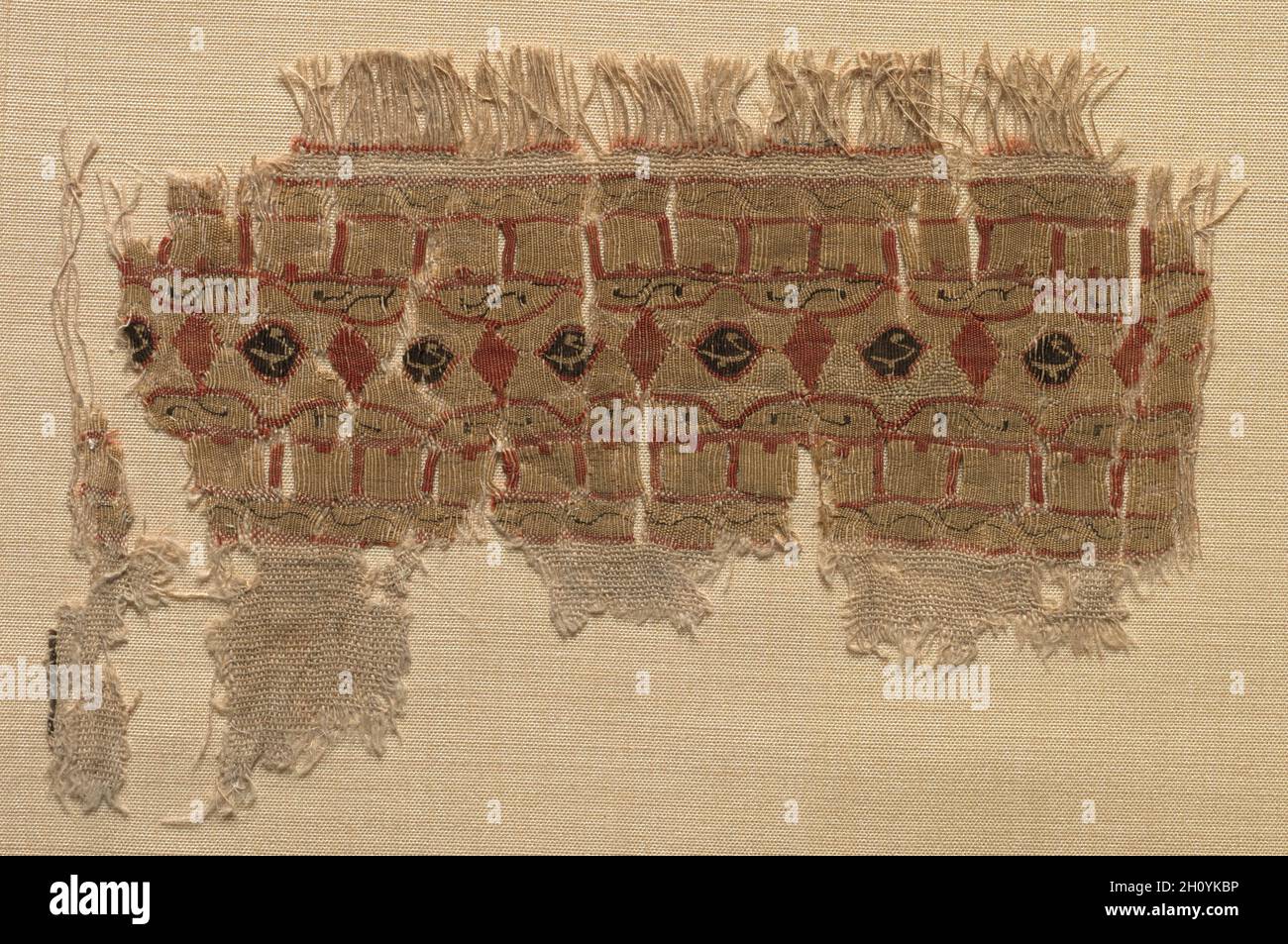 Fragment of a Tiraz-Style Textile, 1101 - 1149. Egypt, Fatimid period, Caliphate of al-Amir or al-Hafiz, AH 495-544, 12th Century. Tabby ground with inwoven tapestry ornament; linen and silk; overall: 8.3 x 12.7 cm (3 1/4 x 5 in.). Stock Photo