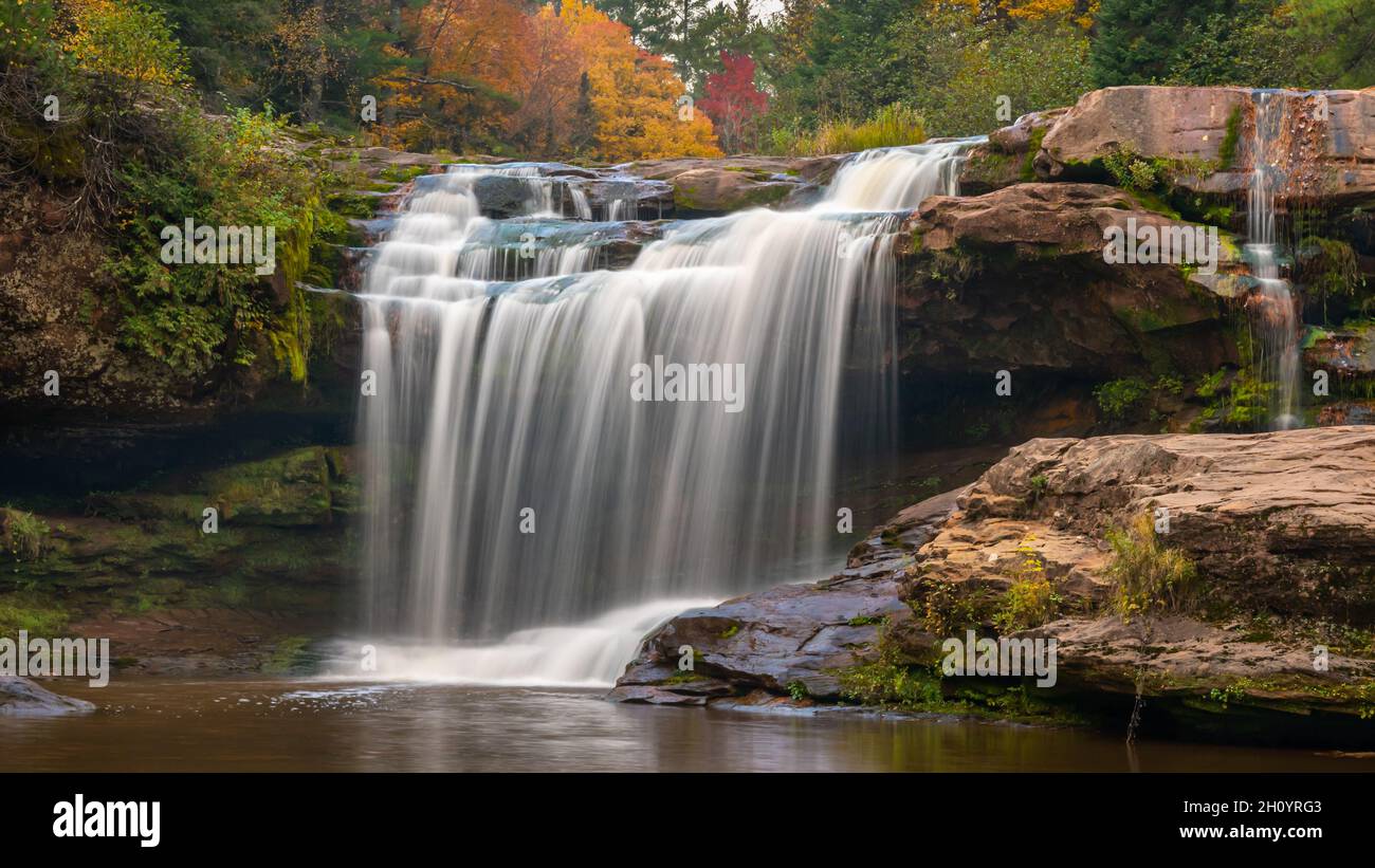 O Kun-de-Kun Falls with a taste of autumn, on the Baltimore River, near Bruce Crossing, Michigan. Stock Photo