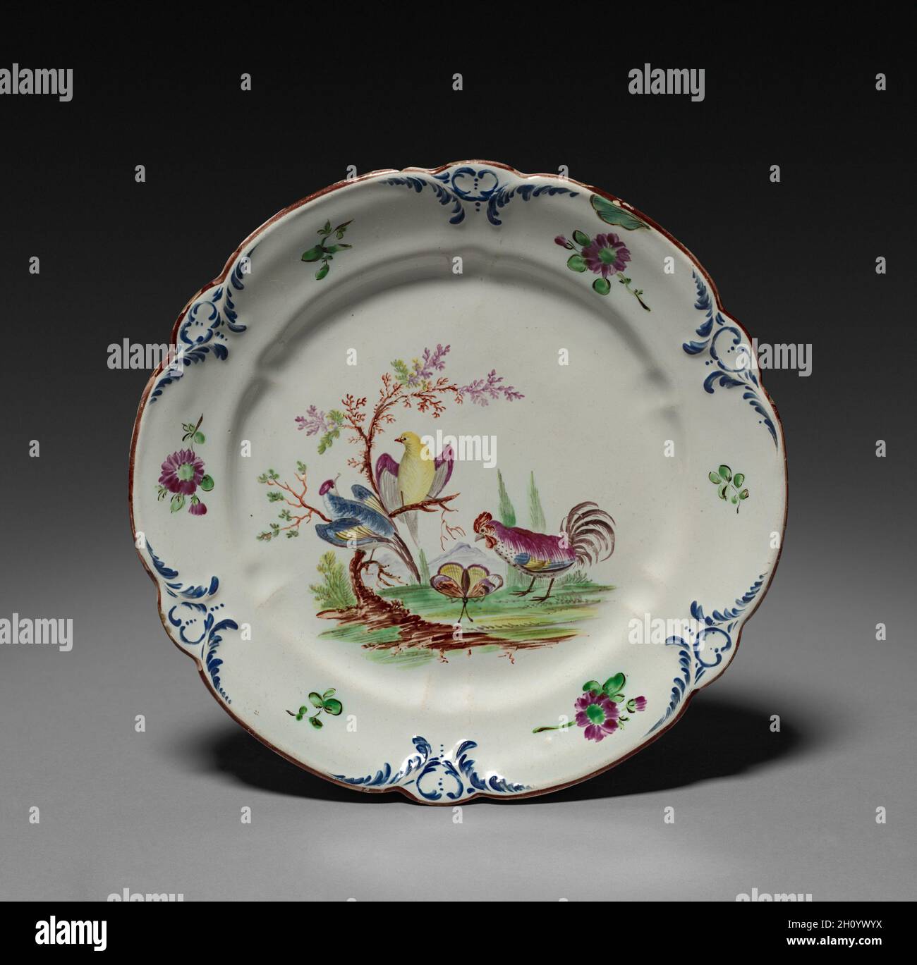 Plate, c. 1775. Rouen Factory (French). Faience; diameter: 24.6 cm (9 11/16 in.); overall: 3.1 cm (1 1/4 in.). Stock Photo