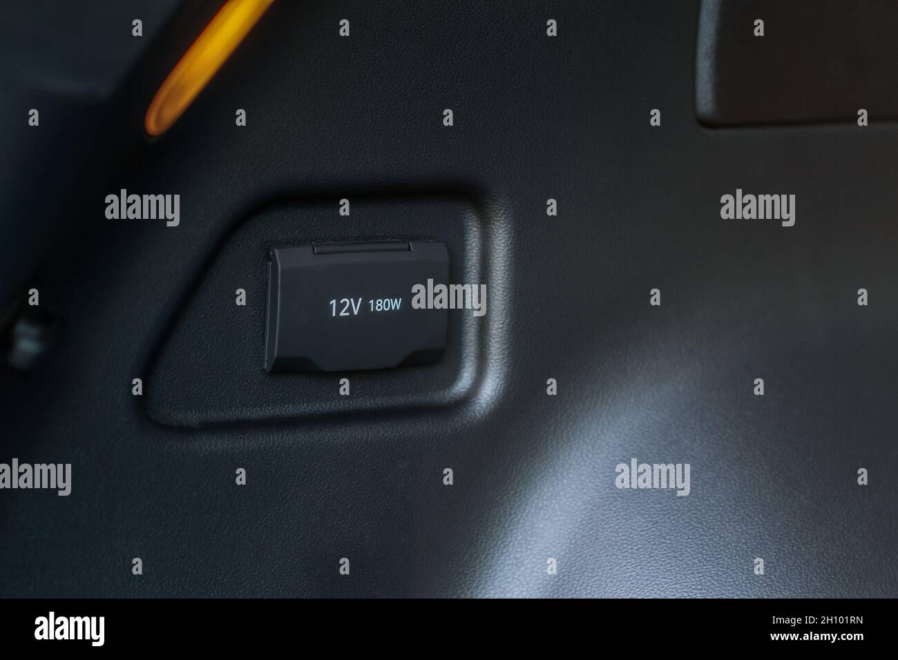 Modern car outlet socket. Closed 12V power outlet socket Stock Photo