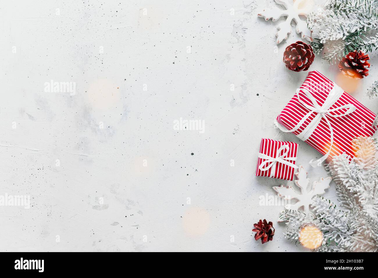 Christmas and New Year flat lay with two red white striped present gift boxes Stock Photo